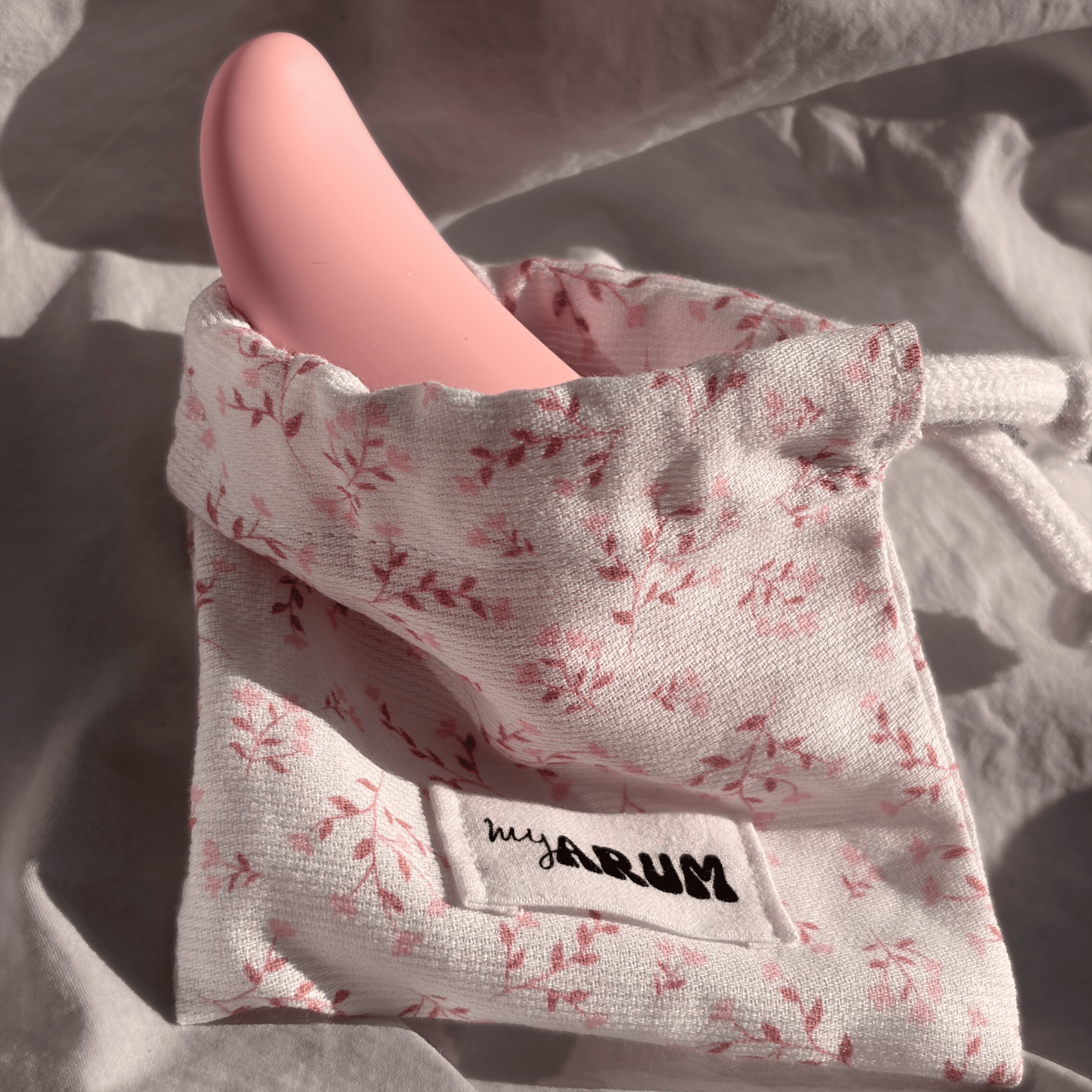 Aimi dans son pochon de protection